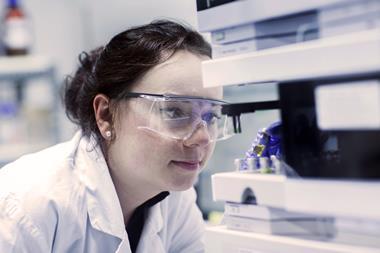 Chemist looking at samples