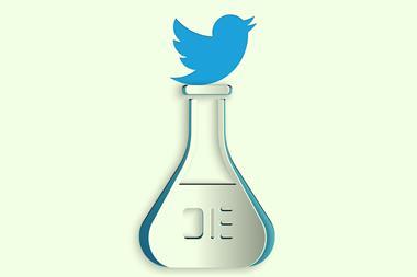 Twitter logo on top of conical flask