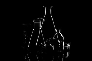 An image showing glassware in the dark