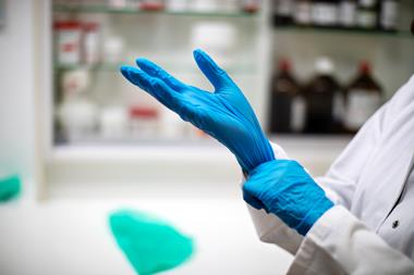 Nitrile glove being put on
