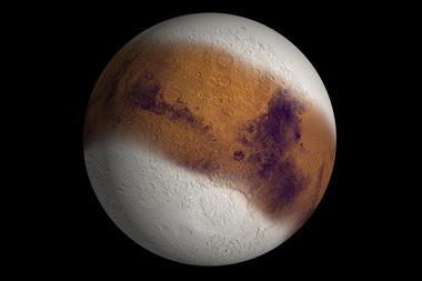 A photorealistic graphic of the red planet as it hangs in the blackness of space. Its poles are covered in thick white layers of ice, only around the equator a band of reddish ground shows.