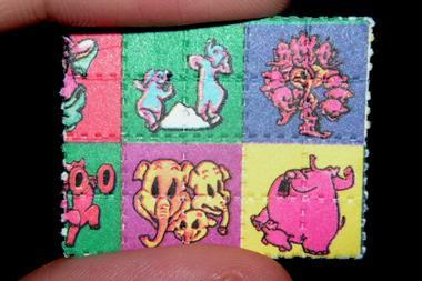 'Pink Elephants on Parade' LSD blotter