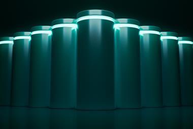 Image showing line up of lithium-ion batteries on dark background