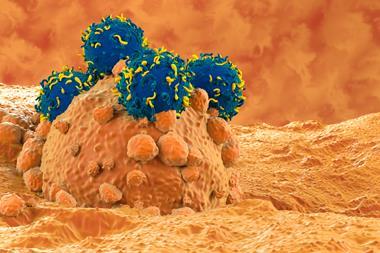 Cancer cell represented in orange on a dark orange background, covered by blue spheres with yellow segments representing CAR-T cells