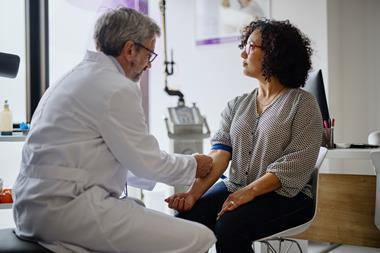 Female patient in consultation with doctor as part of a clinical trial