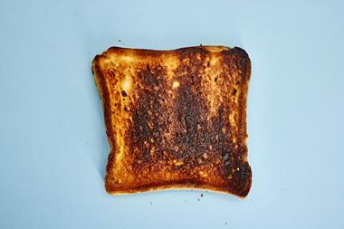Burnt toast on a blue background