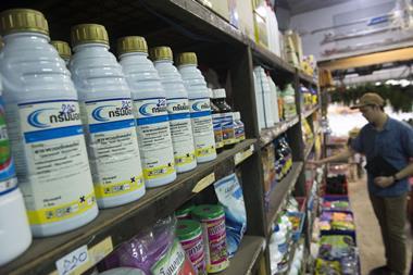 Bottles of paraquat insecticide on sale in a shop in Thailand