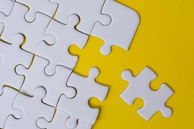 Image shows pieces of a jigsaw puzzle