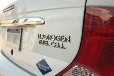 Photo of the hydrogen fuel cell sign seen on the back of a hydrogen-powered vehicle