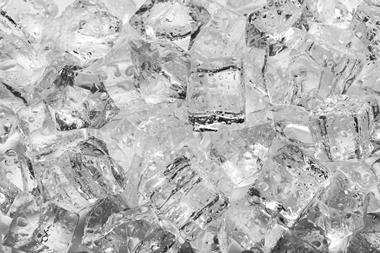 Ice cubes with drops close up