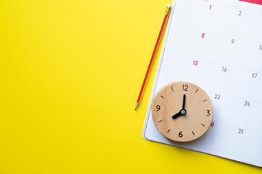 A clock and 1 month calendar on yellow background