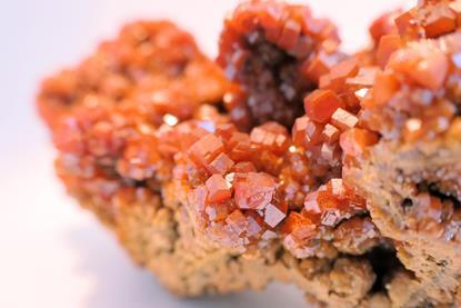 Red vanadinite cluster crystal growing in cubes formation