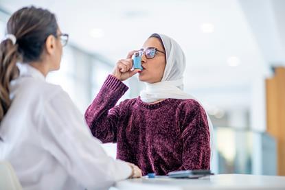 Patient with inhaler