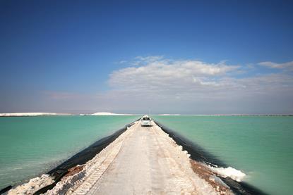 An image showing brines pools of the Salar de Atacama