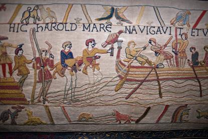 Bayeux medieval tapestry featuring embrodered scenes of battle