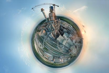 Planet earth with cement factory tower