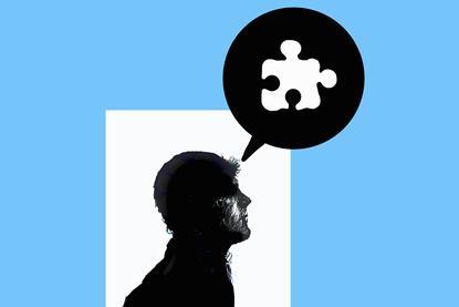 An image showing a man and a puzzle piece