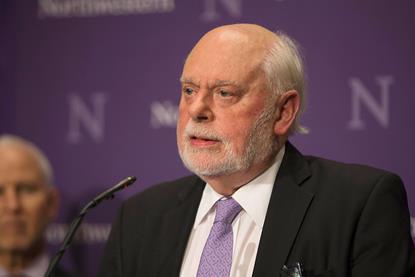 Fraser Stoddart giving a speech at a lectern