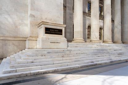 The white marble steps and columns outside the Byron White Courthouse