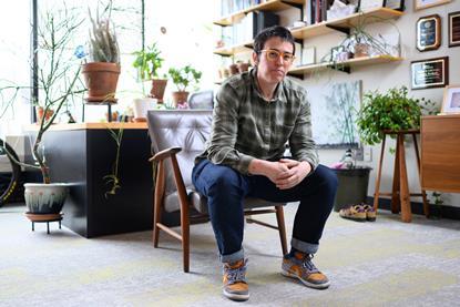 Alison Wendlandt in an office with plenty of plants
