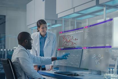 Lab with two scientists using SYNTHIA software on four futuristic projection screens