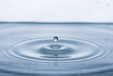 Droplet falling into water