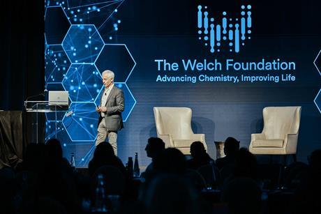 Eric N Jacobsen, Harvard University, taking the stage at the  Welch Foundation conference in 2024