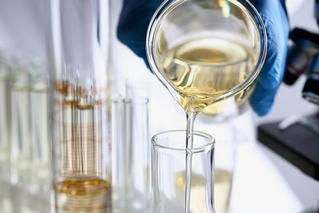 Testing oil samples in lab glassware