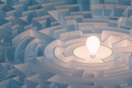 Illustration of lightbulb at the centre of a maze