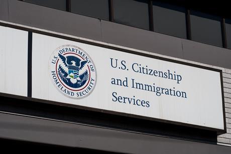 The sign on a building for the US Department of Homeland Security US Citizenship and Immigration Services