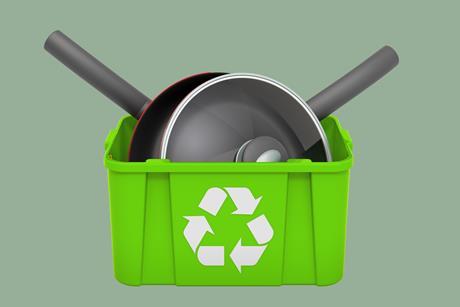 Frying pans in recycling crate