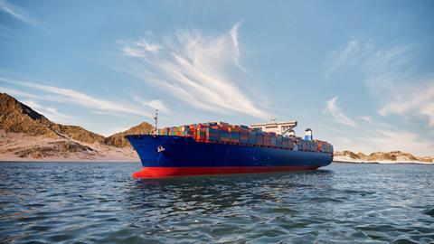3D render illustration of a cargo ship in the Persian Gulf representing global trade risk and Hormuz logistics blockade during Iran and Israel conflict.