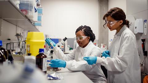 An image showing two female scientists in the lab