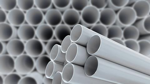 PVC pipes stacked in a warehouse
