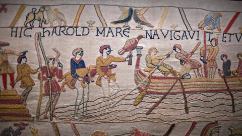 Bayeux medieval tapestry featuring embrodered scenes of battle
