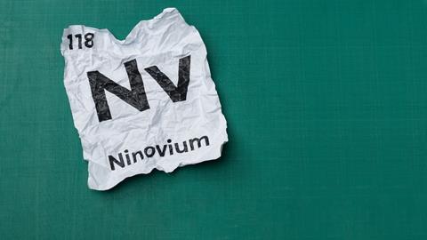 An image showing a scrunched up piece of paper with the details of element 118 - Ninovium - Written down