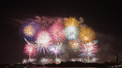 A photograph of a fireworks display over Venice