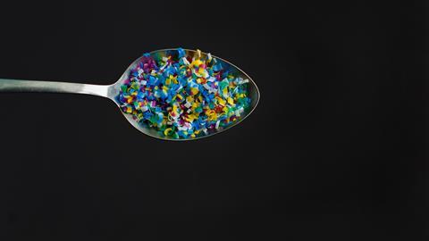 An image showing microplastics placed inside a spoon