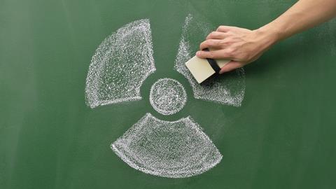 An image showing a radioactive sign being erased