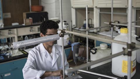 An image showing a student working inside the chemistry lab at the Simon Bolivar University campus in Caracas, Venezuela