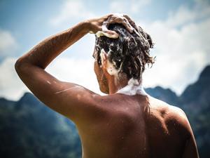 Man washing his hair