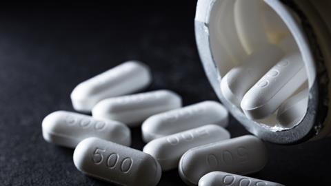 Paracetamol tablets against a dark background 