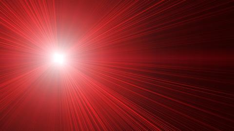 An image showing red laser beams on black