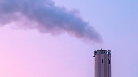 A photo of smoke coming from the chimney of an incineration plant