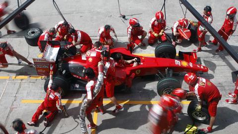 Scuderia Ferrari Marlboro crews do pit-stop practice at the 2009 F1 Petronas Malaysian Grand Prix April 4, 2009 in Sepang Malaysia.