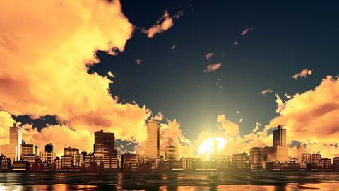 Setting sun over a city
