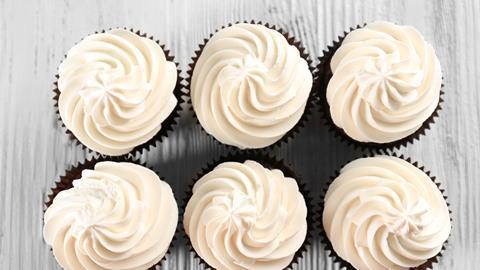 An image showing white cupcake frosting