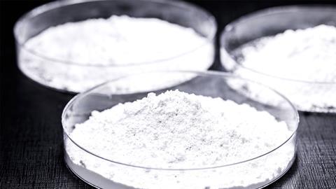 A fine white powder of silica in glass petri dishes