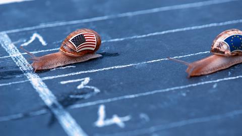 A snail with a US flag on it beats one with an EU flag on it in a race