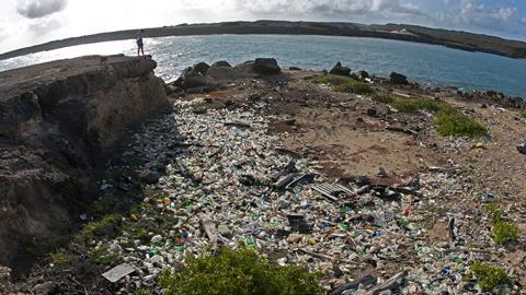 An image showing lots of plastic on a beach